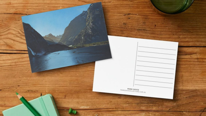 Milford Sound postcard showing front artwork and writing side